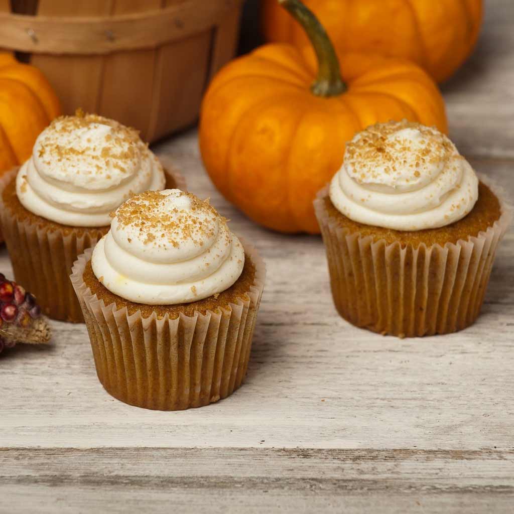 Pumpkin & Dark Chocolate Muffins with Orange Mascarpone Frosting