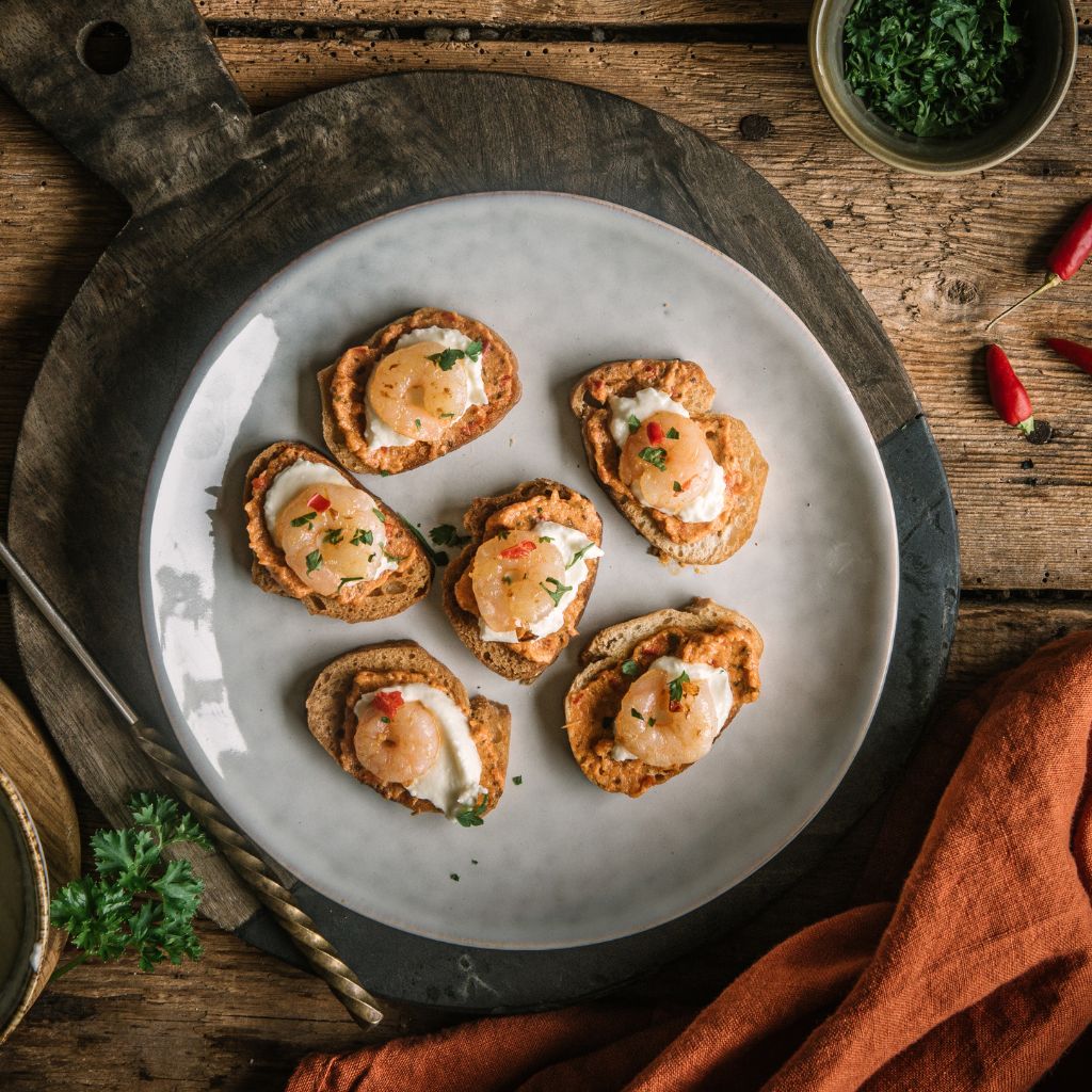 Chargrilled Pepper Pesto Crostini with Chilli prawns & whipped feta