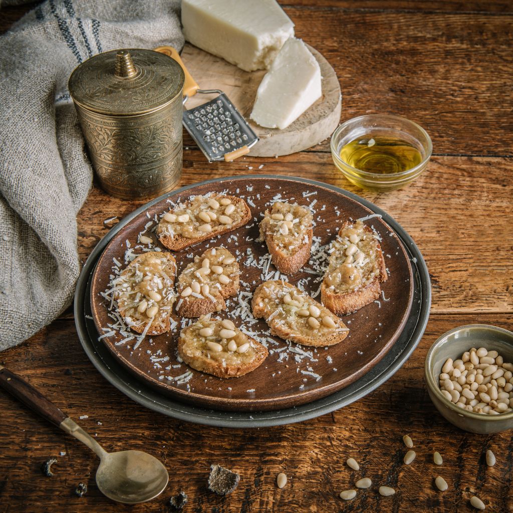 Truffle Pesto Crostini with pecorino, pine nuts & olive oil