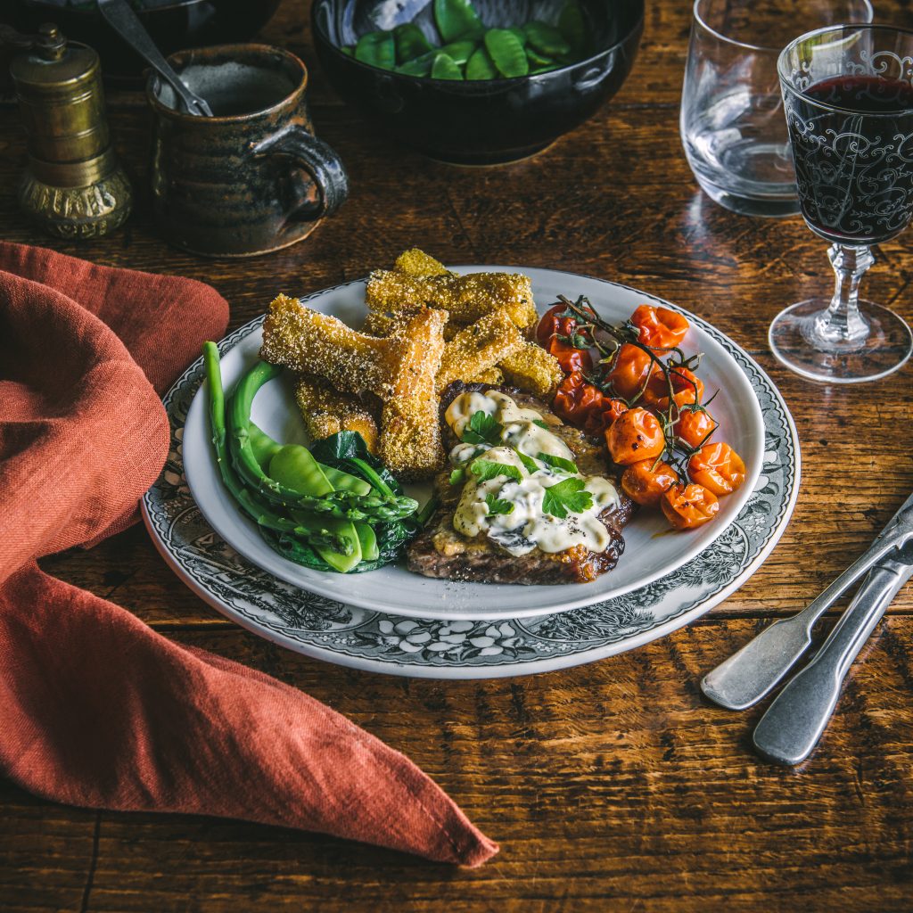 Steak with creamy mushroom and truffle sauce