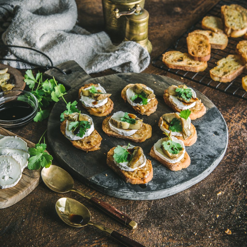 Truffle pesto and goats cheese crostini