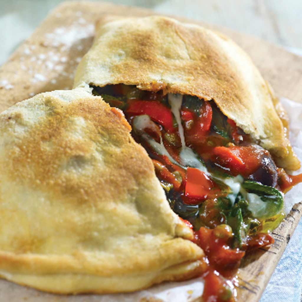 Baked Panzerotti With A Tomato And Spinach Filling