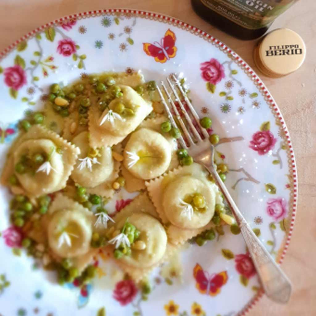 Carmela’s Mascarpone, pea & lemon ravioli with Olive oil & wild garlic flowers.