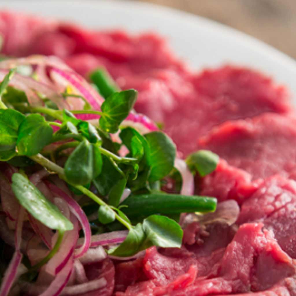 Carpaccio of Beef with a Sweet and Sour Onion and Green Bean Salad