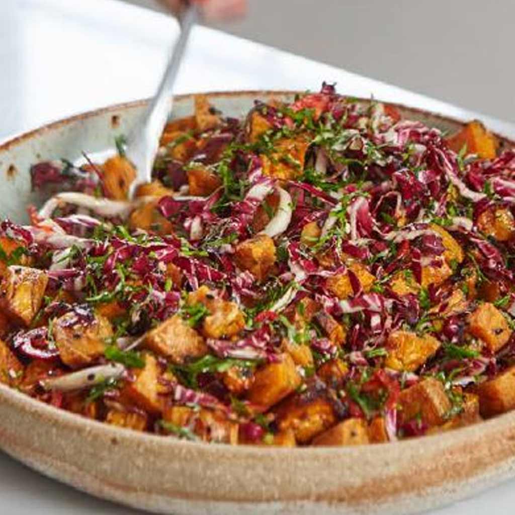 Deliciously Ella’s Spiced Peanut Sweet Potatoes
