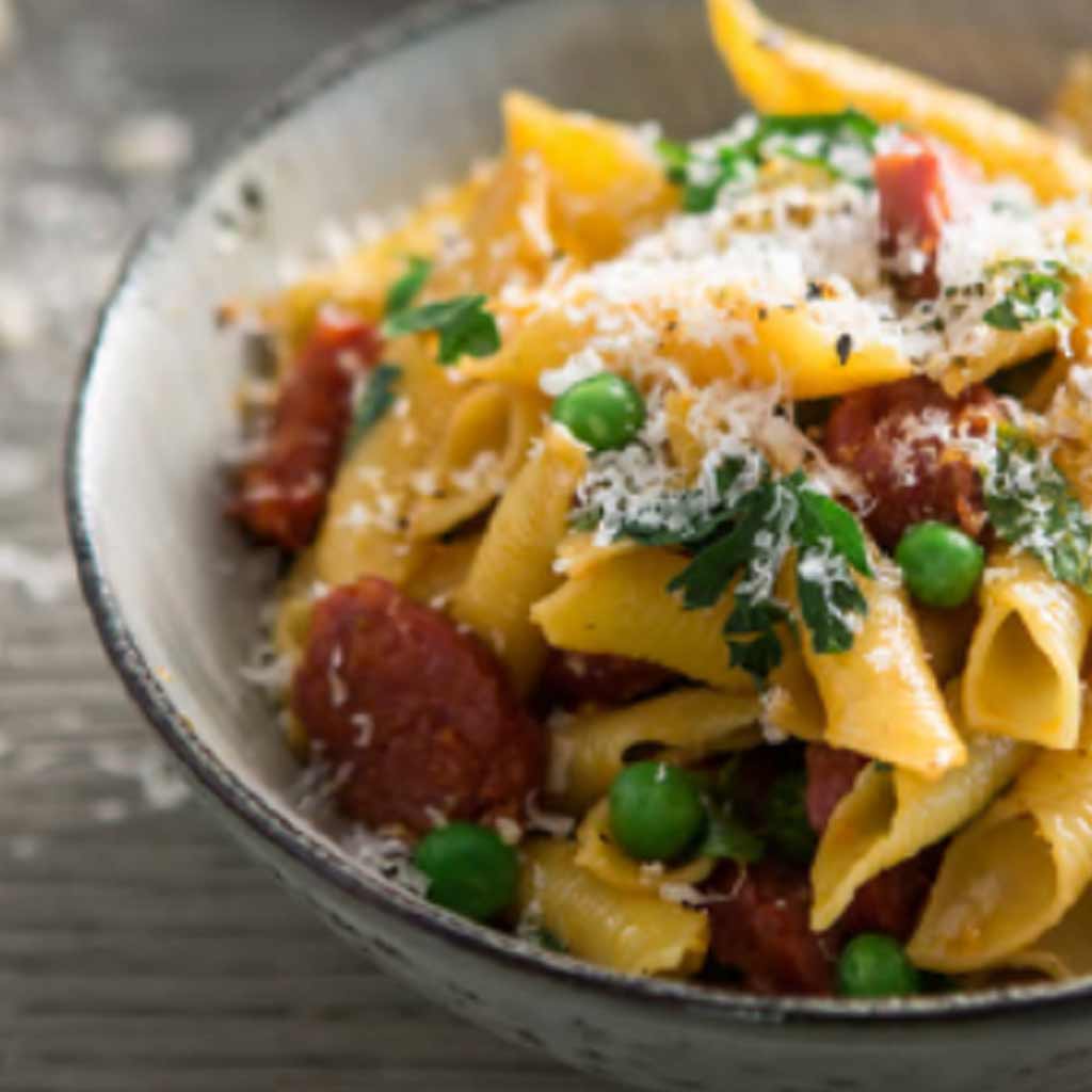 Garganelli pasta with chorizo and peas