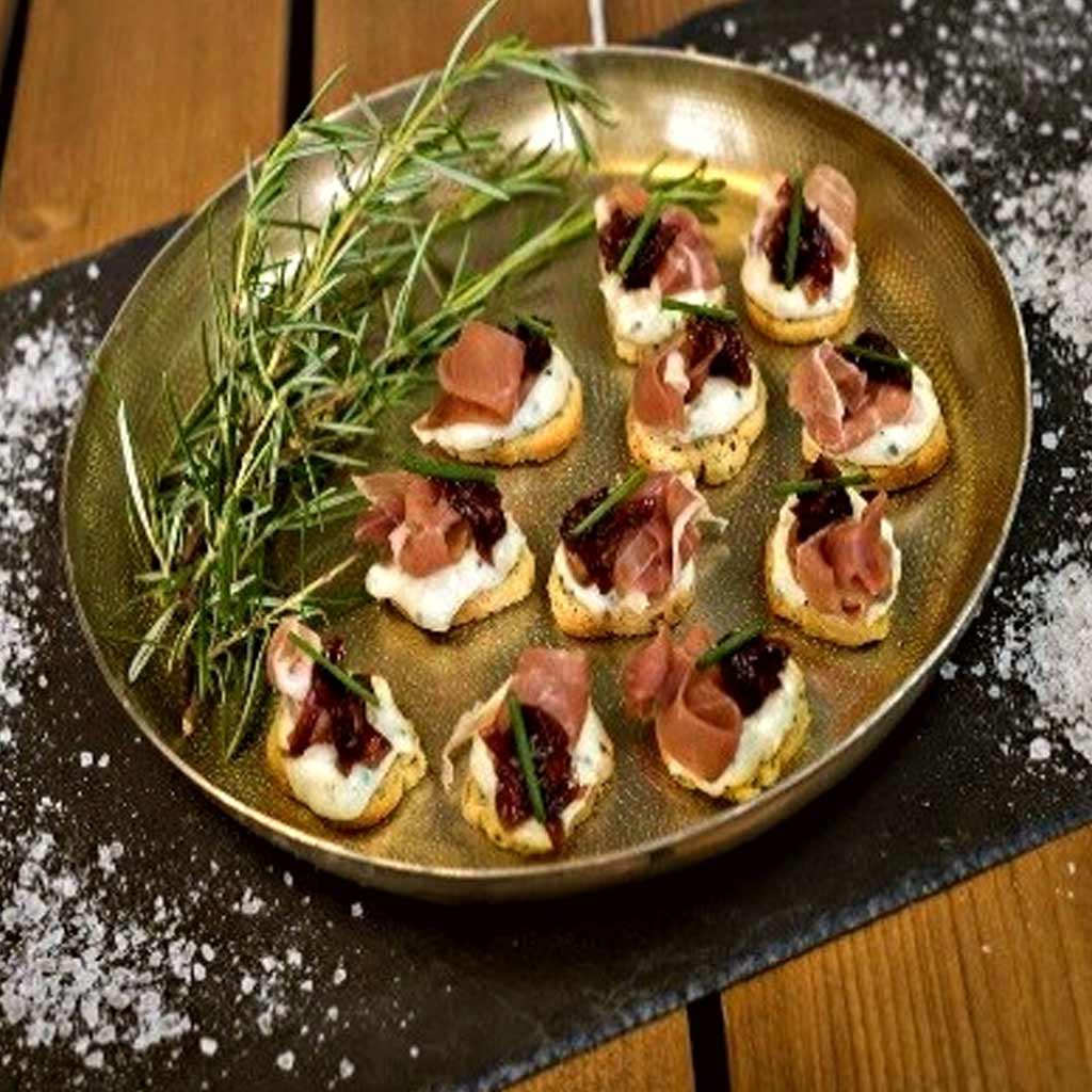 Rosemary & Sea Salt Crostini’s topped with Parma Ham, Gorgonzola & Red Onion Marmalade